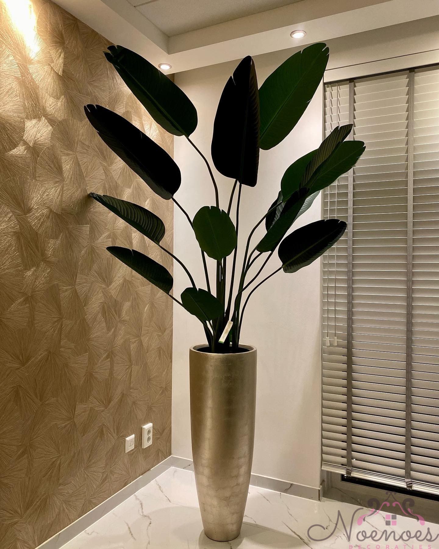 Strelitzia kunstplant in champagne metallic vaas 90 cm hoog